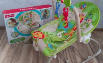 Leżaczek bujaczek marki Fisher Price.
